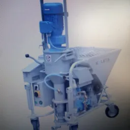 Agregat tynkarski marki Kaleta na kółkach, widoczny silnik, zbiornik i panel sterowania.