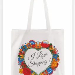 Biała torba bawełniana z długimi uchwytami (70cm) i folkowym nadrukiem kwiatowym w kształcie serca z napisem 'I Love Shopping!'.