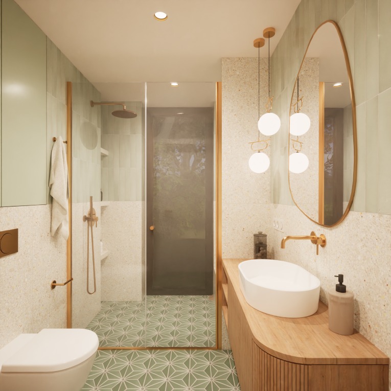 Nowoczesna łazienka z kabiną prysznicową, umywalką na drewnianym blacie i lustrem o organicznym kształcie. Dominuje zieleń i złote akcenty.