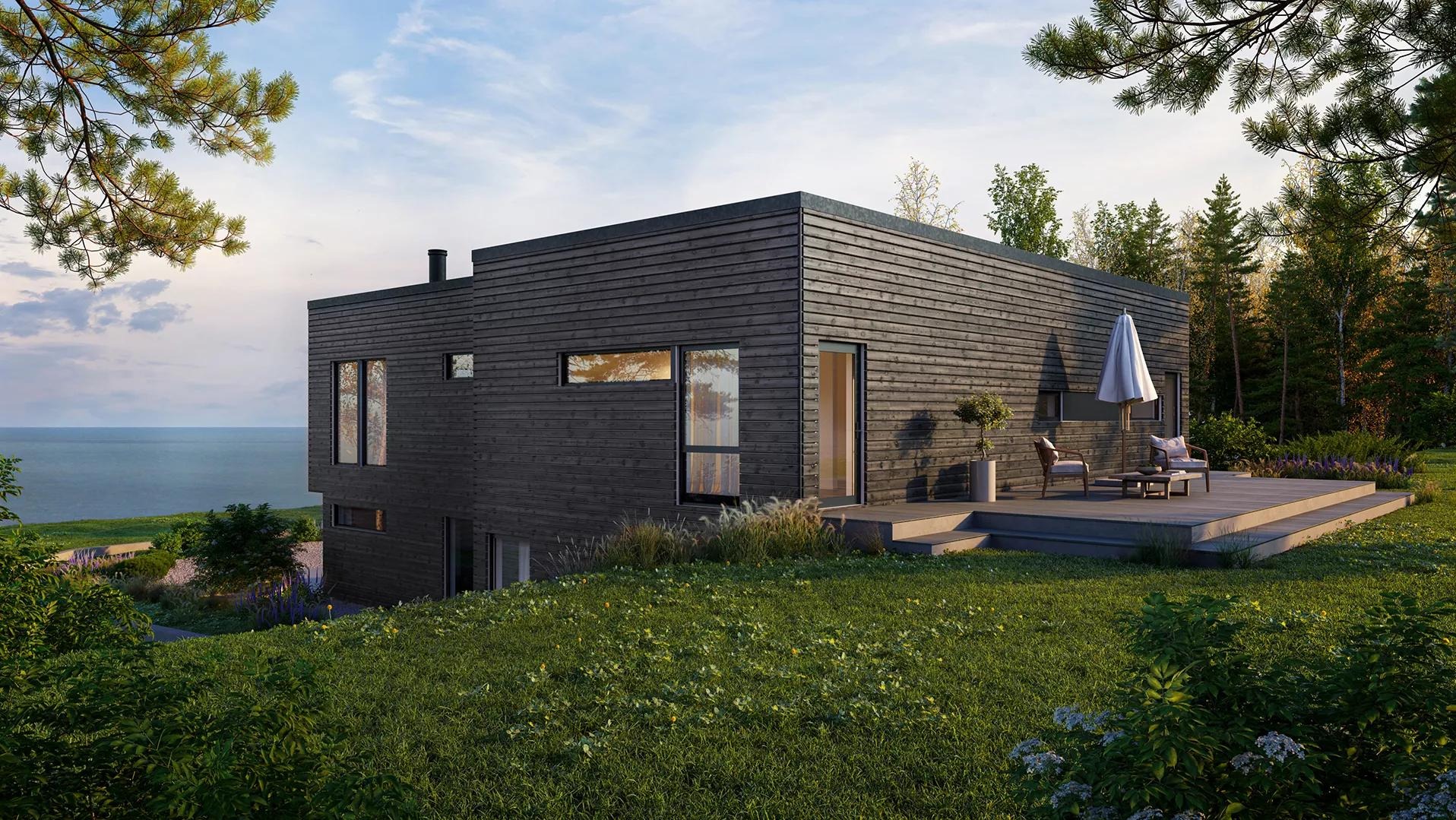 Czarny, nowoczesny dom z drewnianą elewacją i tarasem z widokiem na morze, otoczony zielenią. Minimalistyczny design z dużymi oknami i prostą bryłą.