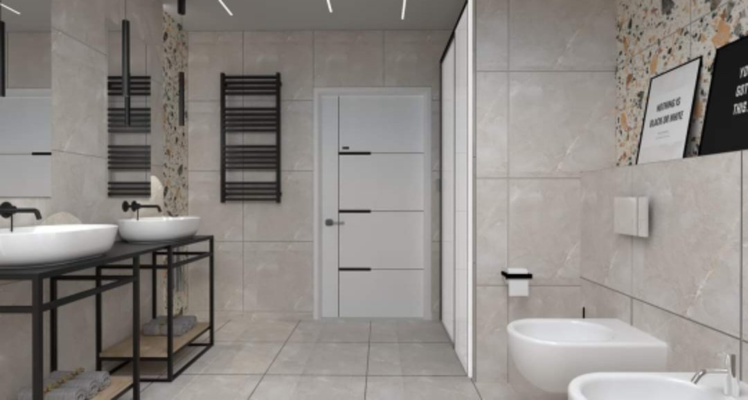 Jasna łazienka z dwoma umywalkami na czarnych metalowych stelażach, grzejnikiem drabinkowym, wiszącą toaletą i bidetem, ozdobnymi płytkami na ścianie oraz białą, nowoczesną drzwiami z poziomymi...