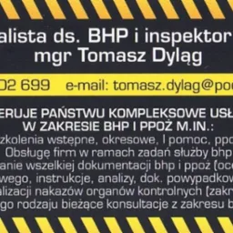 Wizytówka specjalisty ds. BHP i inspektora PPOŻ, mgr. Tomasza Dyląga, z numerem telefonu i adresem e-mail, oferującego kompleksowe usługi w zakresie BHP i PPOŻ, w tym szkolenia, obsługę firm...
