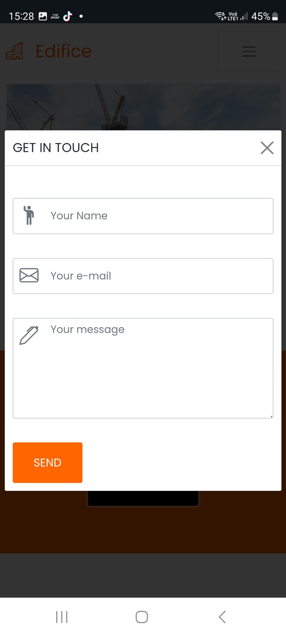 Formularz kontaktowy 'Get in Touch' na stronie internetowej firmy Edifice, widok z ekranu smartfona, z polami do wpisania imienia, adresu e-mail i wiadomości, oraz pomarańczowym przyciskiem 'Send'.
