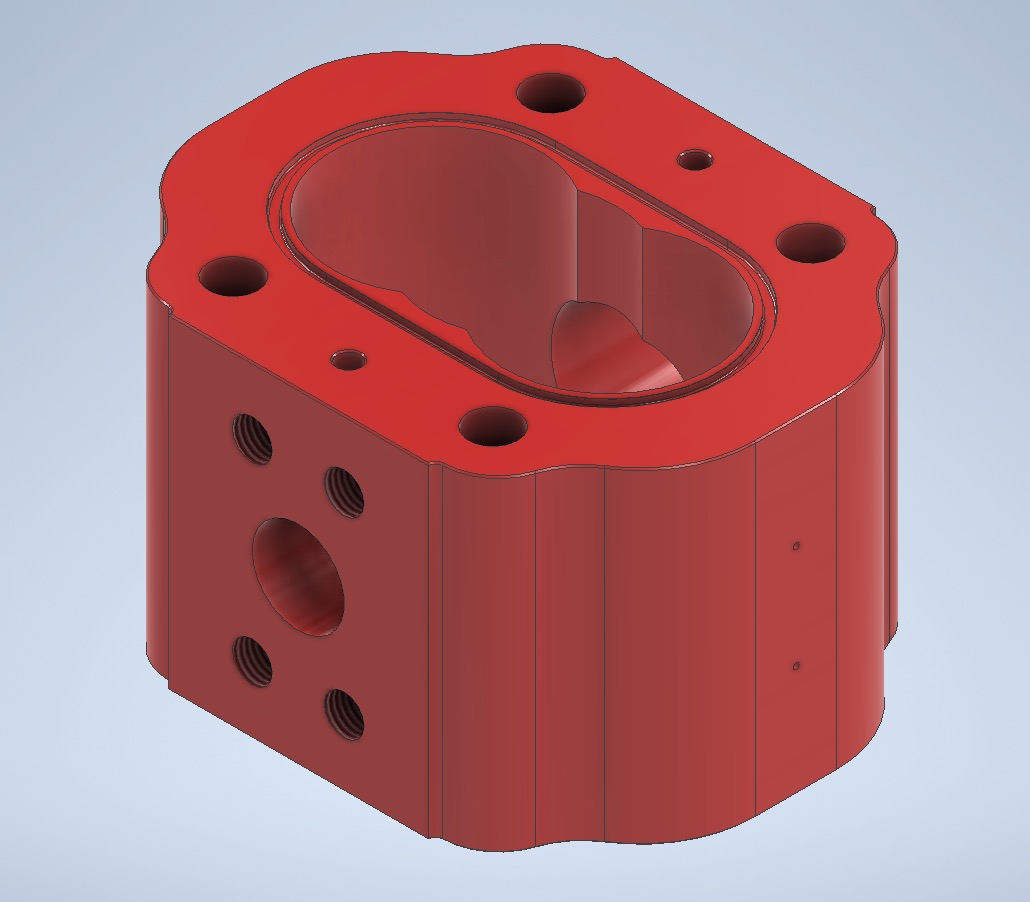 Czerwony, trójwymiarowy model CAD bloku z otworami o różnych średnicach, w tym gwintowanymi, na jasnoniebieskim tle.