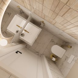 Jotem Studio - Elegancka łazienka z dwoma umywalkami nablatowymi, złotymi akcentami armatury i oświetleniem LED wokół lustra, wykończona marmurowymi płytkami na podłodze i ścianach.