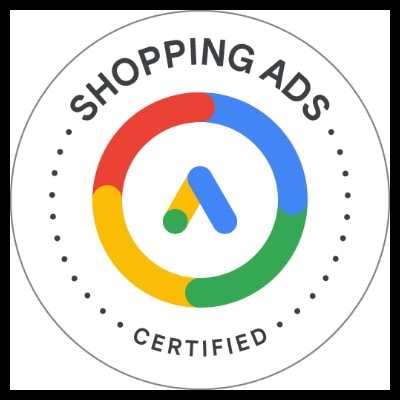 Okrągły certyfikat Google Ads z napisem 'SHOPPING ADS CERTIFIED' wokół kolorowego logo Google Ads.