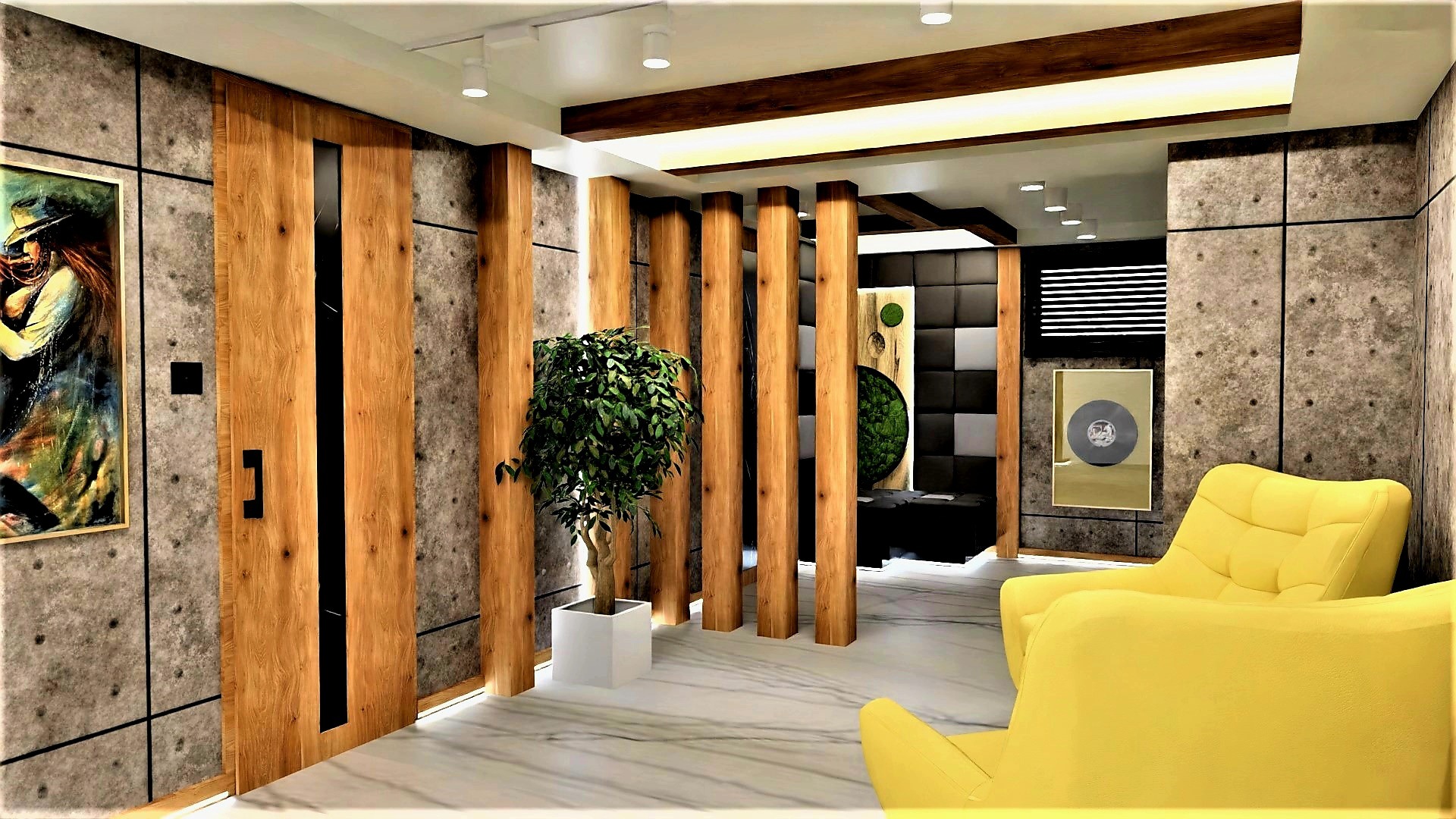 Wnętrze pokoju z betonowymi ścianami, drewnianymi elementami, żółtymi fotelami i obrazami na ścianach, oświetlone punktowymi lampami.