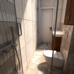 Mapi Studio Paulina Preś - Nowoczesna łazienka z kabiną prysznicową, beżowymi płytkami i drewnianą szafką pod umywalką. Widoczny fragment toalety i drzwi wejściowe.