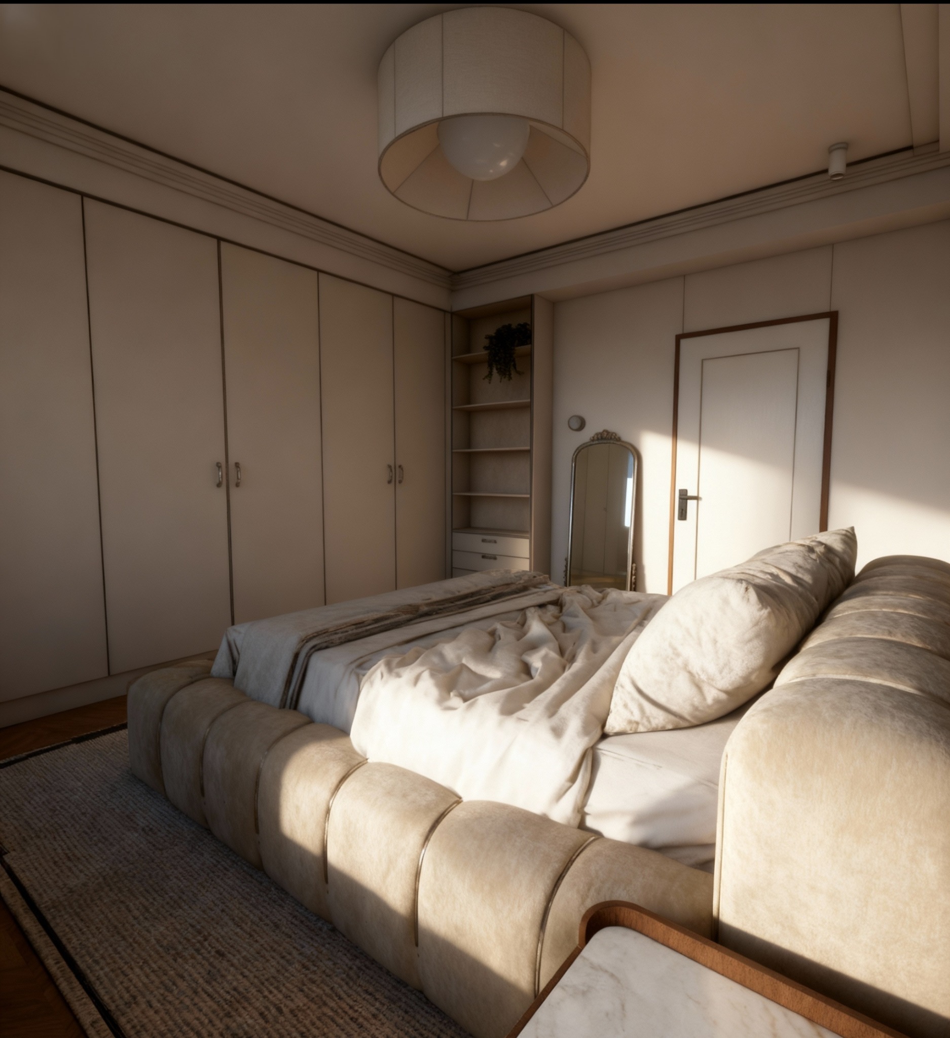 Jasna sypialnia z beżowym łóżkiem, szafą w zabudowie i lustrem. Minimalistyczny design z okrągłą lampą sufitową i dywanem w neutralnych barwach. Przytulne i nowoczesne wnętrze.