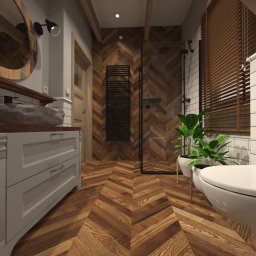 MODERN STUDIO W.FIRLEJ, M.FIRLEJ Spółka cywilna - Wnętrze łazienki z drewnianą podłogą w jodełkę, umywalką z kamienia na szarej szafce, kabiną prysznicową z drewnianą ścianą i białymi płytkami na ścianach, roletami w oknach i roślinami doniczkowymi.