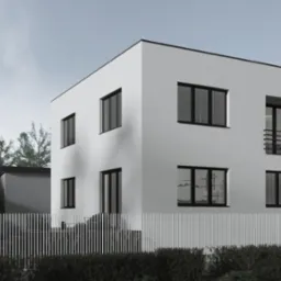 Dwukondygnacyjny dom w stylu minimalistycznym z białym tynkiem i czarnymi ramami okiennymi, otoczony białym ogrodzeniem i zielenią. Widok z zewnątrz w pochmurny dzień.