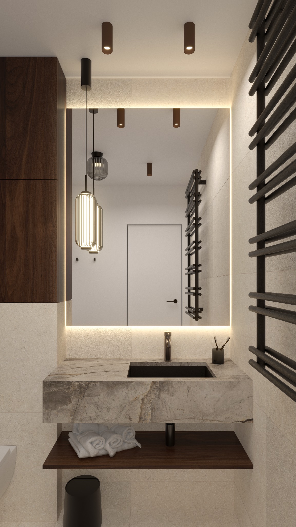 Nowoczesna łazienka z marmurową umywalką, podświetlanym lustrem i designerskimi lampami wiszącymi. Grzejnik drabinkowy w kolorze grafitowym.