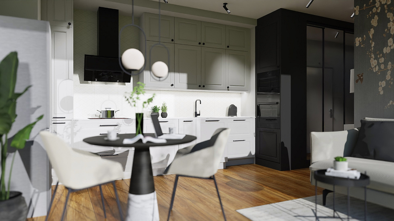 Wnętrze nowoczesnej kuchni z jadalnią, białe szafki z czarnymi uchwytami, czarny okap i zabudowa piekarnika, drewniana podłoga, okrągły stół z laptopem i krzesłami, widok na salon z szarą sofą.