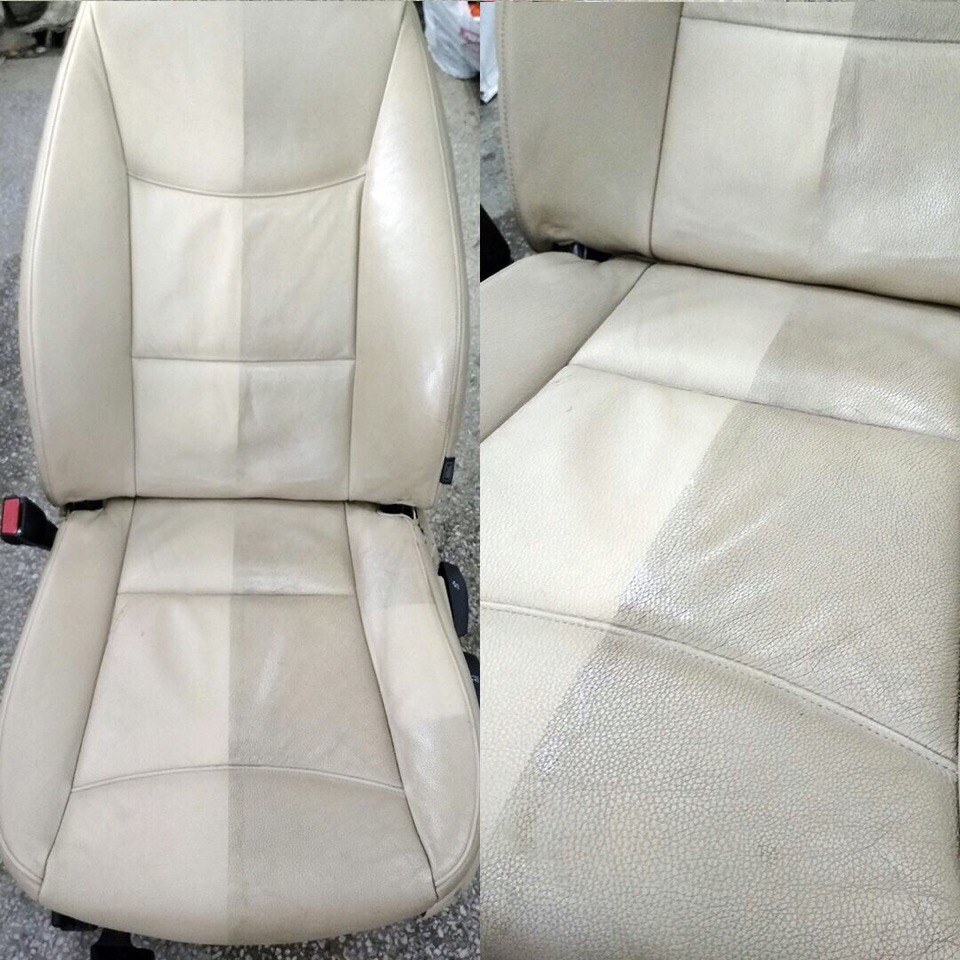 Beżowe skórzane siedzenie samochodowe, widoczna różnica w czystości między wypraną i niewypraną częścią, ujęcie z bliska prezentujące strukturę skóry.