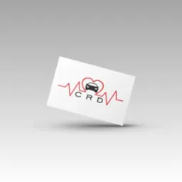 Wizytówka z grafiką pulsu serca, sylwetki samochodu i liter CRD, lekko uniesiona nad szarym tłem.