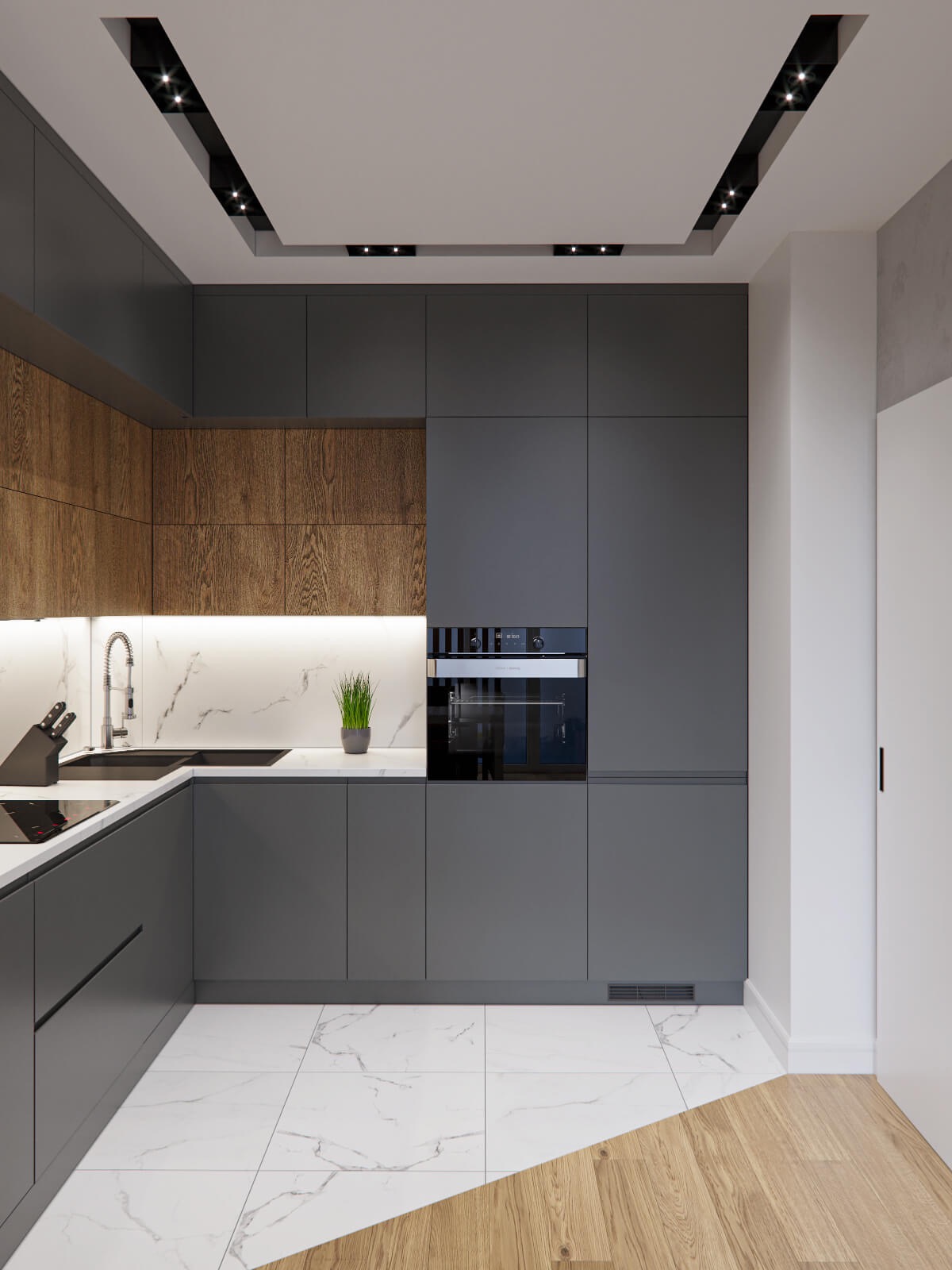 Nowoczesna kuchnia z szarymi frontami szafek, drewnianymi akcentami i białym blatem imitującym marmur, oświetlenie punktowe w suficie