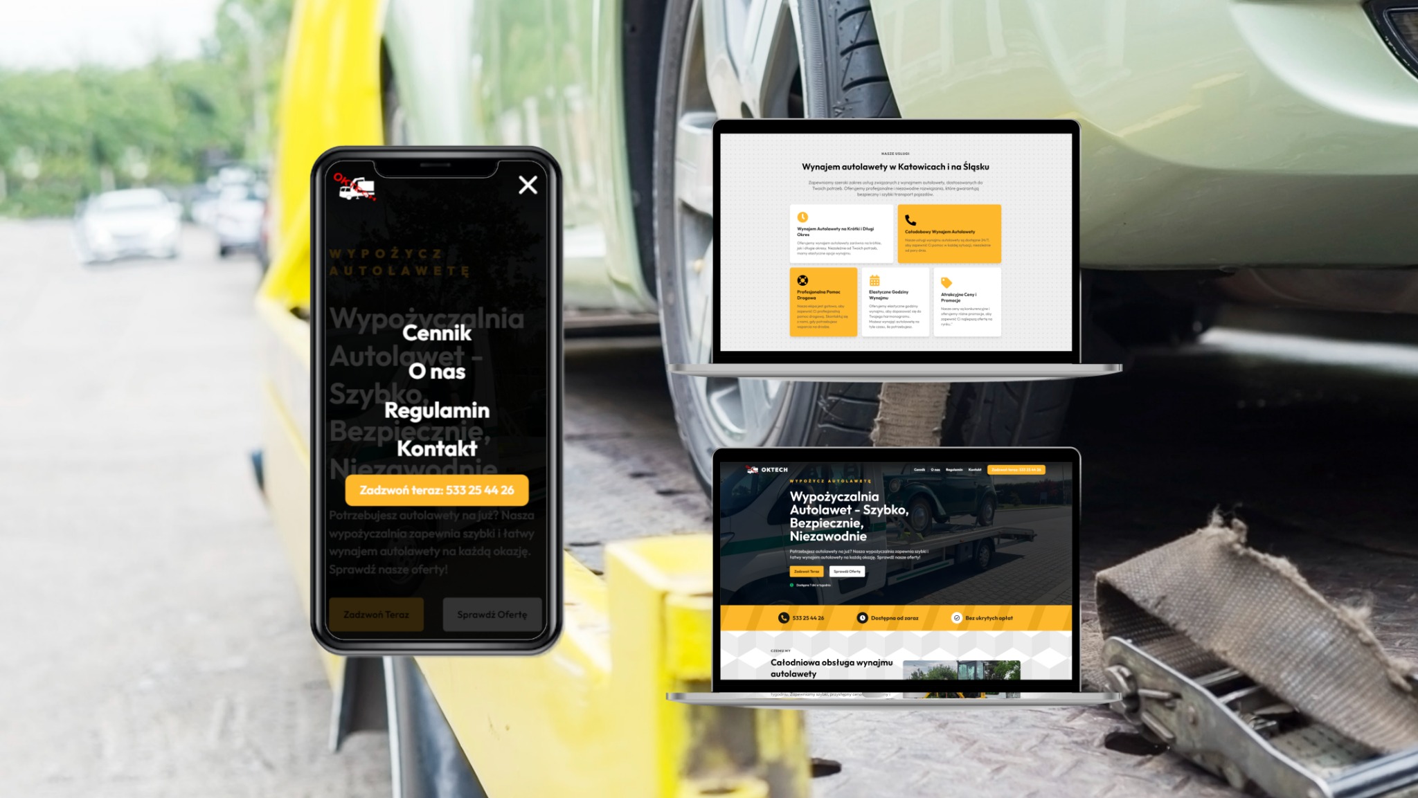 Ekran smartfona i dwa laptopy prezentujące strony internetowe wypożyczalni autolawet na żółtej platformie lawety, z widocznym fragmentem koła samochodu w tle.