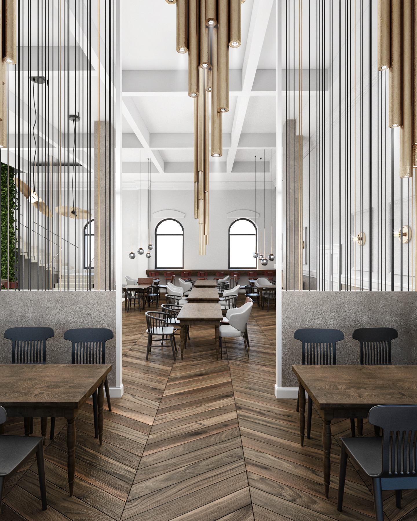 Wnętrze restauracji z drewnianą podłogą ułożoną w jodełkę, ciemnymi drewnianymi stołami i krzesłami, dekoracyjnymi lampami zwisającymi z sufitu oraz ścianami w jasnych odcieniach szarości i bieli.