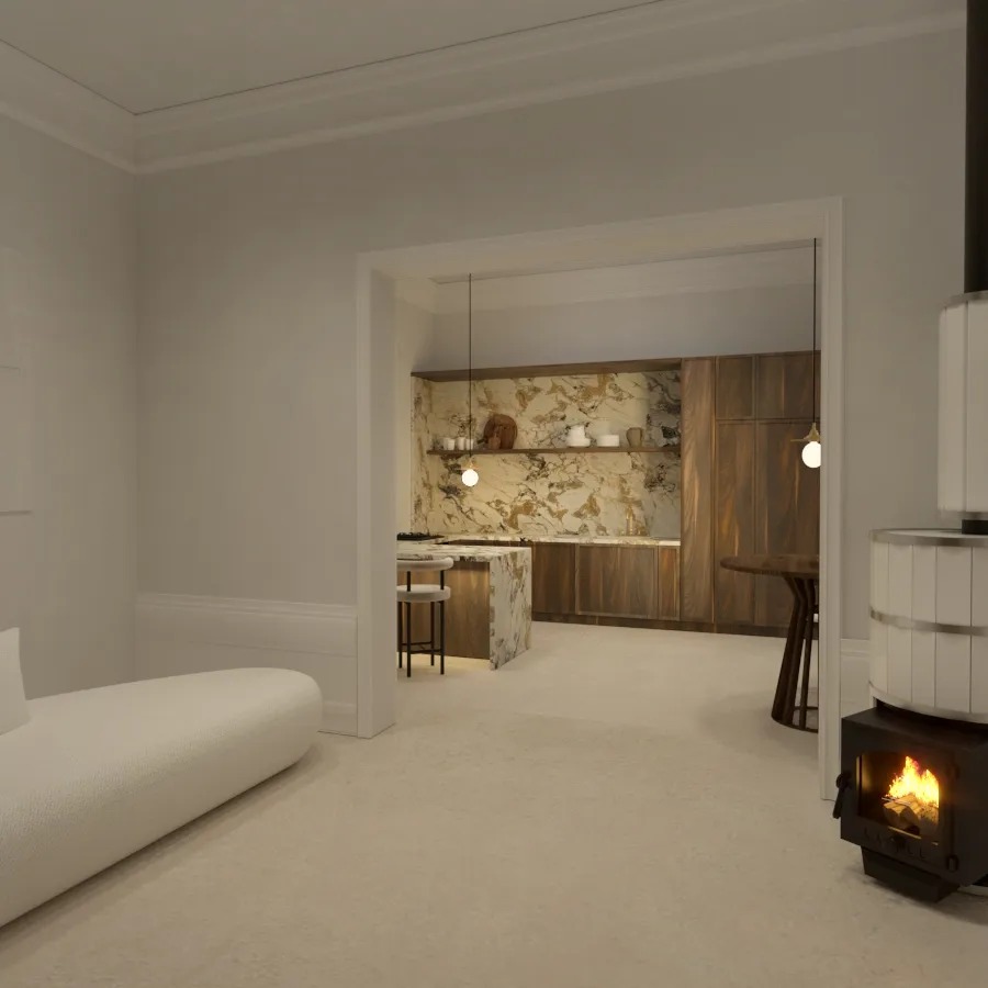 Salon z widokiem na kuchnię: biała sofa, kominek z płomieniami, marmurowa wyspa kuchenna, drewniane szafki i dekoracyjny marmur na ścianie.