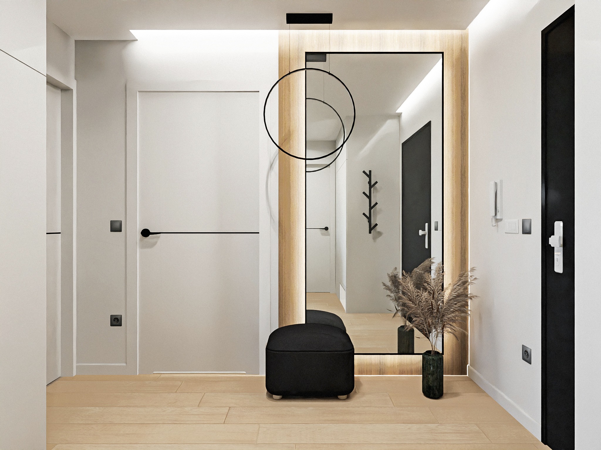 Nowoczesny przedpokój z dużym lustrem w podświetlanej ramie, czarnym pufem i dekoracyjną suchą trawą w wazonie. Minimalistyczna lampa wisząca z okręgów, białe i czarne drzwi.