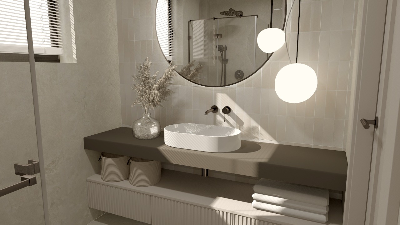 Nowoczesna łazienka w beżach: owalne lustro, biała umywalka nablatowa, minimalistyczna armatura, dekoracyjna trawa w wazonie i wiszące lampy kule.