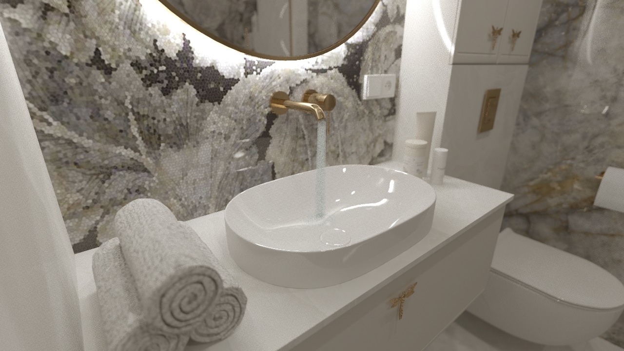 Nowoczesna łazienka z umywalką nablatową, złotą armaturą i mozaikową ścianą. Białe meble z dekoracyjnymi uchwytami. W tle toaleta i akcesoria łazienkowe.