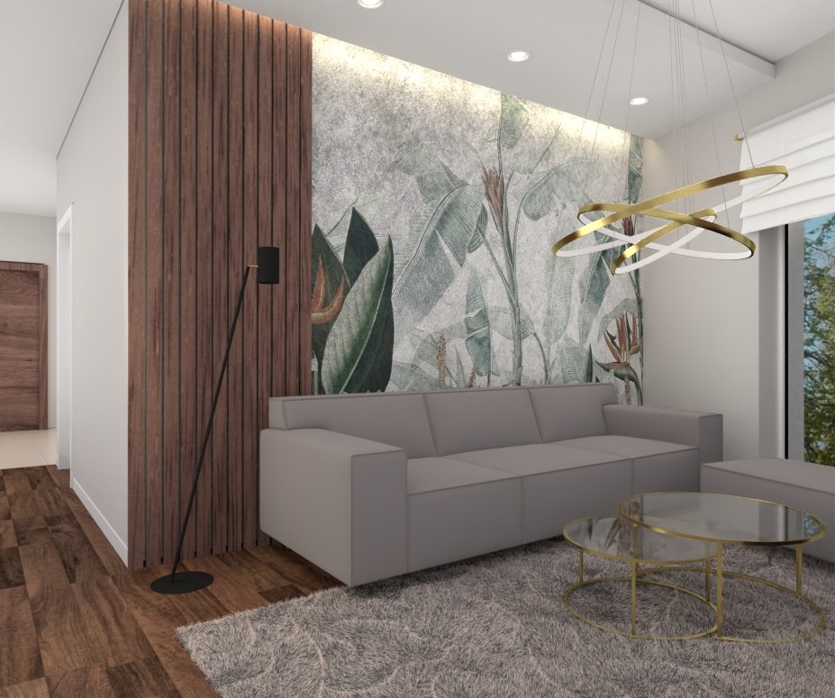 Wizualizacja salonu z szarą sofą, stolikami kawowymi ze złotymi ramami i tapetą w motywy roślinne, oświetlonego nowoczesną lampą wiszącą z okrągłymi elementami.