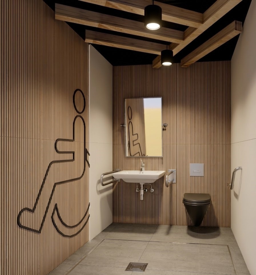 Nowoczesna łazienka dla niepełnosprawnych z drewnianymi panelami, umywalką z uchwytami, toaletą i lustrem. Na ścianie grafika wózka inwalidzkiego.