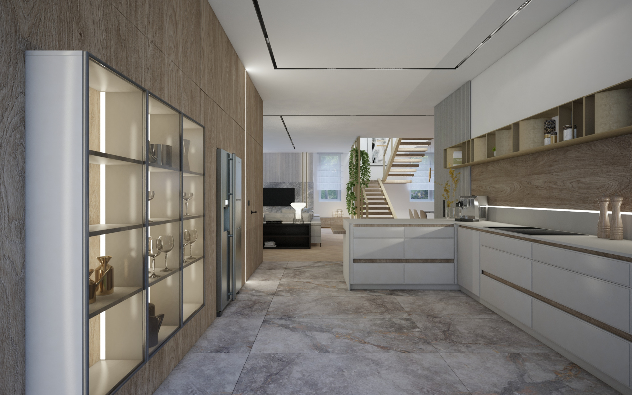 Nowoczesna kuchnia z białymi szafkami, drewnianymi akcentami i szklaną witryną z oświetleniem, widok na salon i schody w tle.