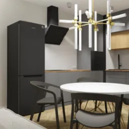 Wizualizacja nowoczesnej kuchni z czarną lodówką Samsung, szarymi szafkami i białym okrągłym stołem otoczonym ciemnymi krzesłami. Nad stołem zwisa złoty, modernistyczny żyrandol. Na ścianie...