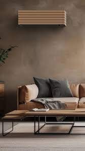 Klimatyzator Toshiba Daiseikai 10 w drewnianej obudowie, zamontowany nad brązową sofą w nowoczesnym wnętrzu. Minimalistyczny design, neutralna kolorystyka.