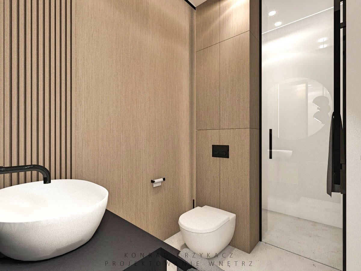 Nowoczesna aranżacja łazienki w Skierniewicach z umywalką nablatową o nieregularnej fakturze, drewnopodobnymi panelami ściennymi z pionowymi listwami i kabiną prysznicową ze szklanymi drzwiami.
