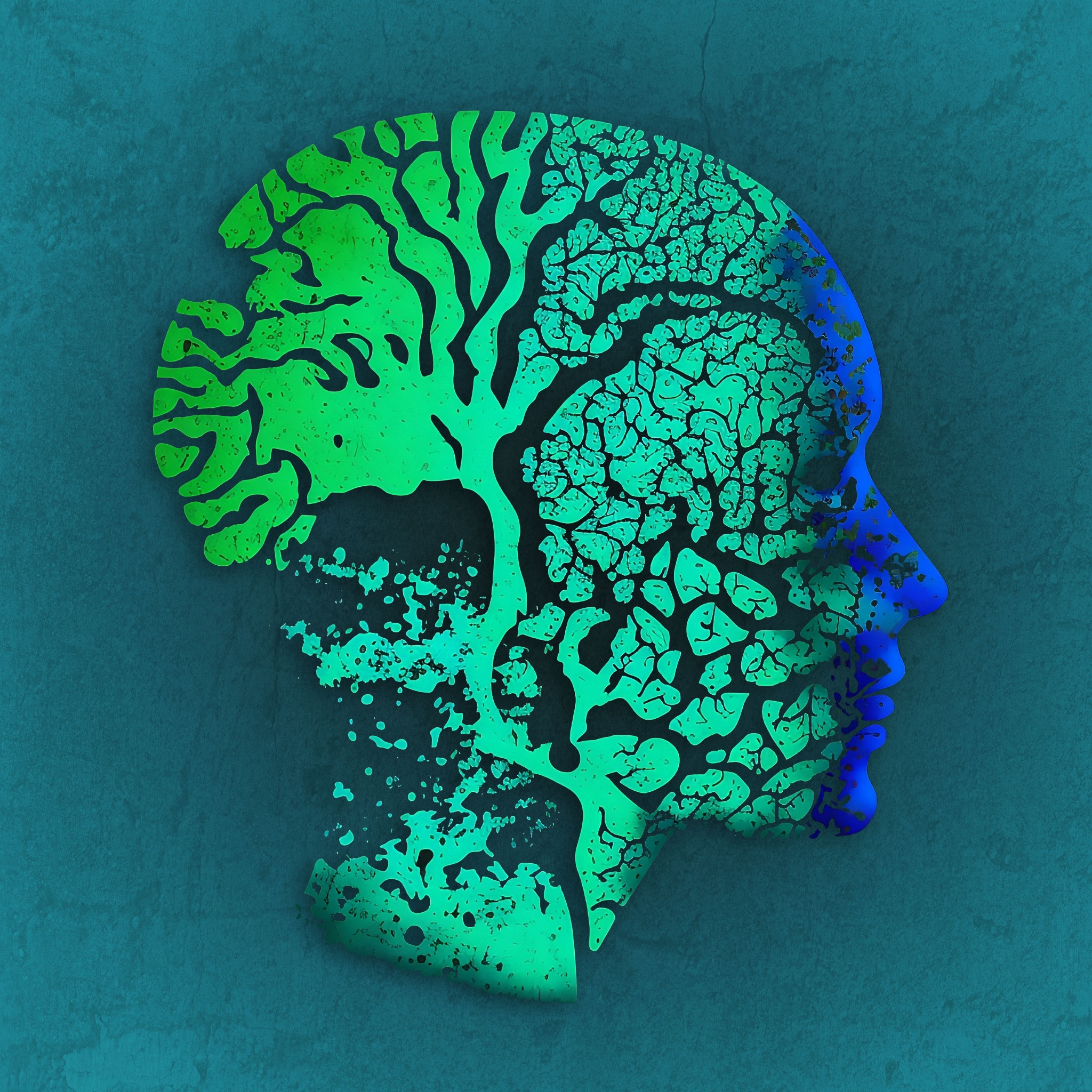 Grafika przedstawia profil głowy wypełniony strukturą drzewa, gdzie lewa strona jest zielona i przypomina korzenie i pień, a prawa strona przechodzi w odcienie niebieskiego i symbolizuje...