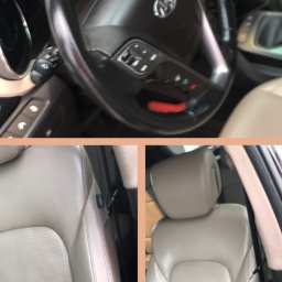 MK Detailing Serwis - Wnętrze samochodu z beżową skórzaną tapicerką, widoczna kierownica i przednie fotele. Fotel kierowcy z widocznymi śladami zużycia na krawędzi siedziska.