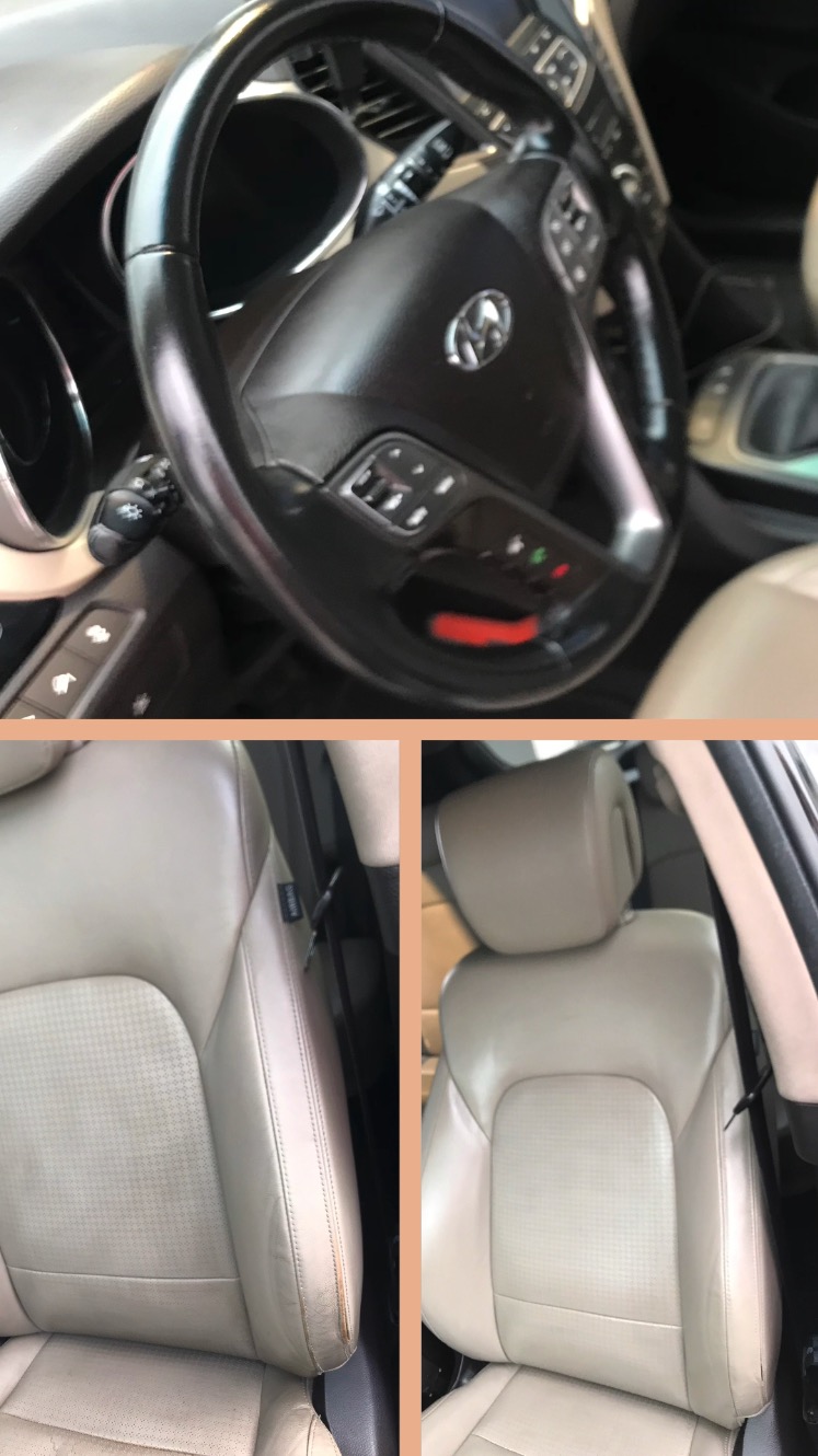 Wnętrze samochodu z beżową skórzaną tapicerką, widoczna kierownica i przednie fotele. Fotel kierowcy z widocznymi śladami zużycia na krawędzi siedziska.