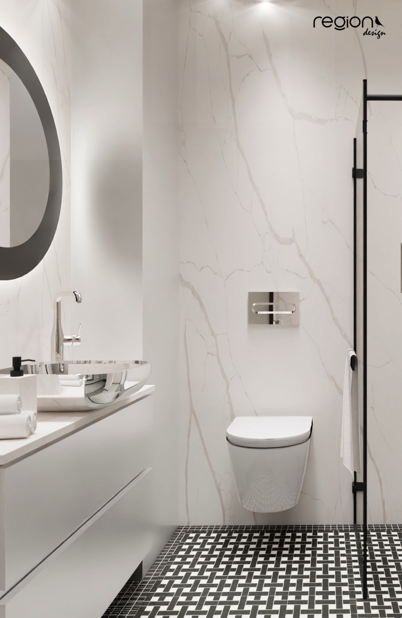 Minimalistyczna łazienka z umywalką w kształcie misy, okrągłym lustrem z podświetleniem, podwieszaną toaletą i czarno-białą wzorzystą podłogą.