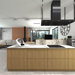 Parter domu jednorodzinnego utrzymany w stylu loft'owym. Ponadczasowy ciepły domowy styl. Zimne materiały (stal,beton) stanowią tło dla ciepłego drewna. Całość uzupełniona regałem, który personalizuje wnętrze indywidualnymi pamiątkami i dekoracjami.