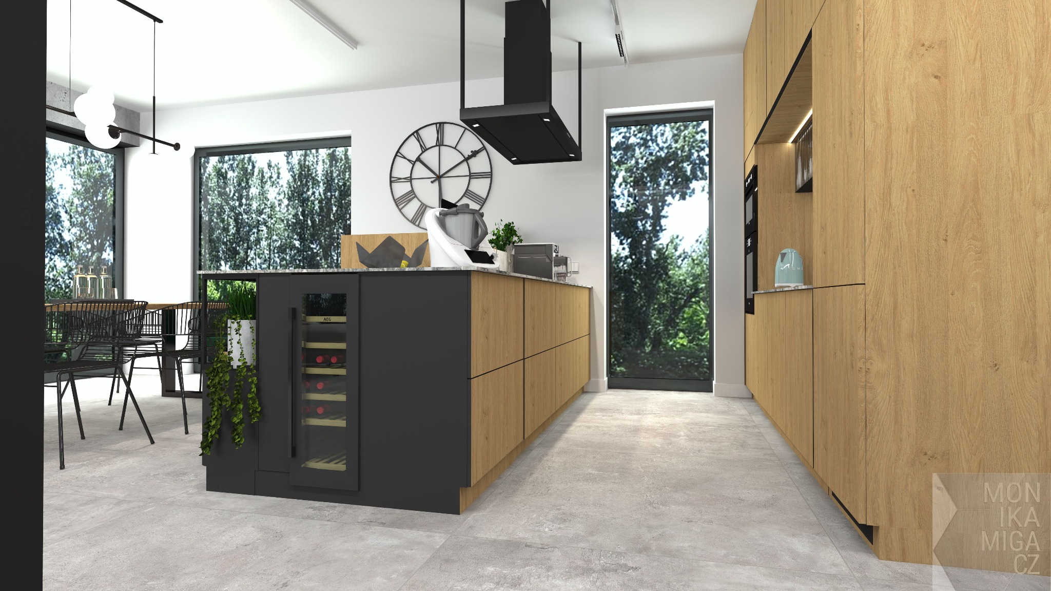 Nowoczesna kuchnia z wyspą, fronty szafek w odcieniach drewna, czarne elementy wyspy i okapu, duży zegar na ścianie, w tle zieleń za oknem.