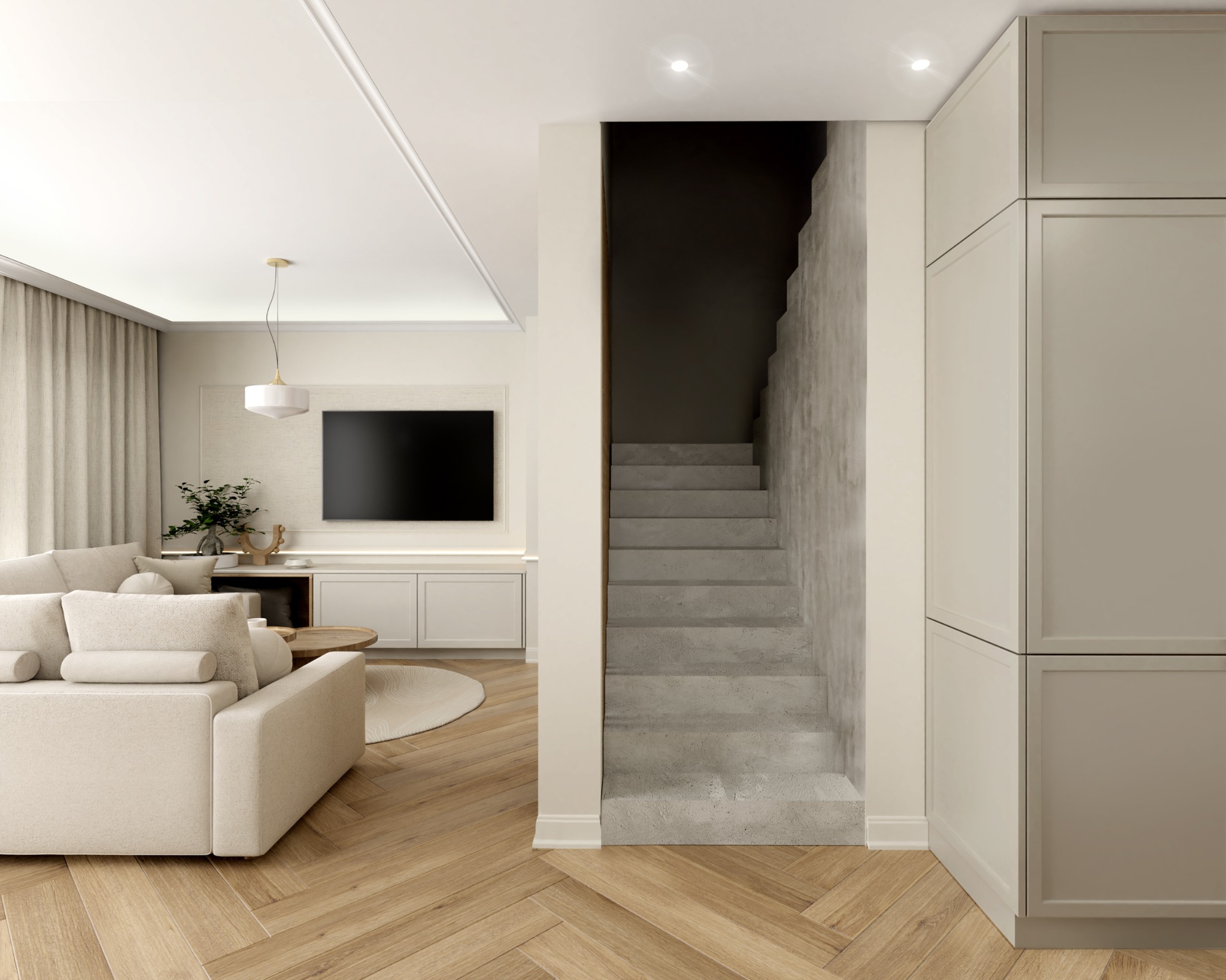 Jasne wnętrze salonu z betonowymi schodami, beżową sofą i parkietem w jodełkę, minimalistyczny design, oświetlenie punktowe i wisząca lampa, szafki w zabudowie.