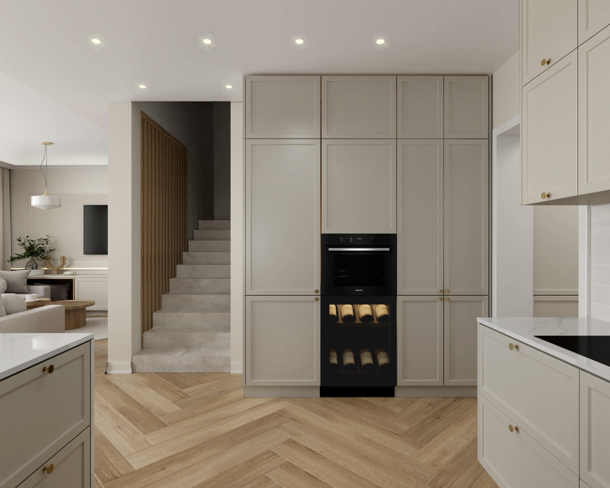 Beżowa kuchnia na wymiar w Trzebnicy, z zabudowaną chłodziarką na wino i piekarnikiem, widok na salon i schody.