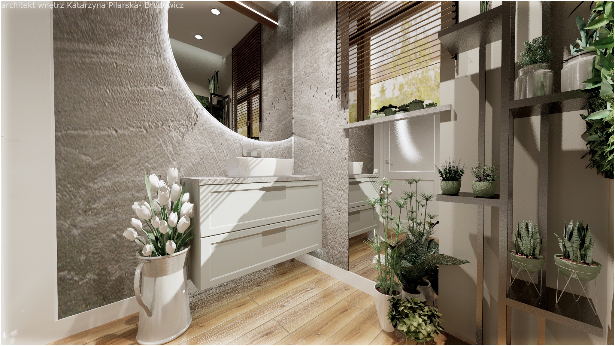 Nowoczesna łazienka z umywalką nablatową, okrągłym lustrem z podświetleniem LED, betonową ścianą i drewnianą podłogą, akcentem są białe tulipany w dzbanku i liczne rośliny doniczkowe.