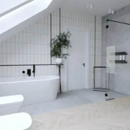 Wizualizacja łazienki na poddaszu z białą wanną wolnostojącą, toaletą i bidetem z czarną armaturą, kabiną prysznicową typu walk-in z marmurowymi ścianami i drewnianą podłogą ułożoną w jodełkę.