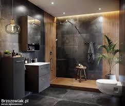 Nowoczesna łazienka z kabiną prysznicową typu walk-in, szara armatura, drewniane akcenty i oświetlenie LED.
