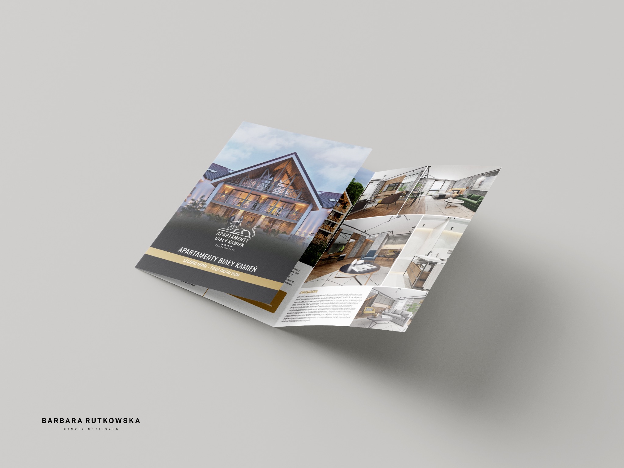 Dwustronna broszura reklamowa z wizualizacjami apartamentów 'Apartamenty Biały Kamień', lewitująca na szarym tle, prezentująca elewację budynku i wnętrza w nowoczesnym stylu.