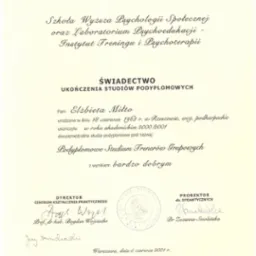 Skan świadectwa ukończenia studiów podyplomowych z psychologii społecznej, wystawionego dla Elżbiety Miłto w 2001 roku, z pieczęciami i podpisami dyrektora oraz prorektora.