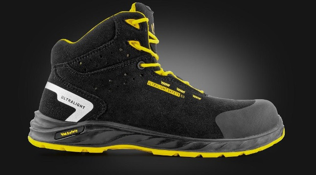 Czarny, wysoki but roboczy z żółtymi akcentami i napisem 'Ultralight Safety S3' na boku, na ciemnoszarym tle.