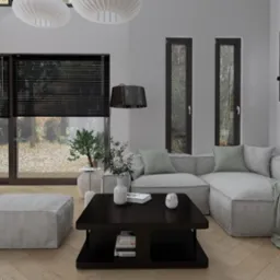 Nowoczesny salon z szarą sofą modułową, czarnym stolikiem kawowym z książkami na dolnej półce, i widokiem na ogród przez okna z czarnymi żaluzjami poziomymi.