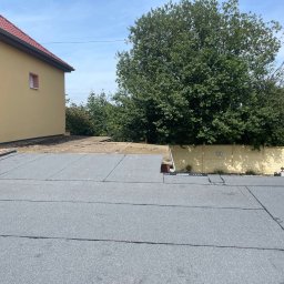 Dach płaski wymiana , zdjęcie azbestowych płyt praca po wykończeniu 