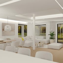 LP Design Studio Projektowe Karolina Paduch - Jasne, przestronne wnętrze z białymi meblami i drewnianą podłogą w jodełkę. Duże okna z widokiem na zieleń. Minimalistyczny design z lampami wiszącymi i abstrakcyjnym obrazem.