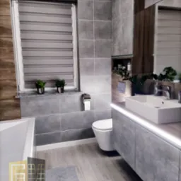 Szara łazienka z podświetlaną szafką umywalkową, toaletą wiszącą i żaluzjami okiennymi. Widoczne szare płytki na ścianach, drewnopodobna okładzina ściany po lewej, biała umywalka nablatowa...